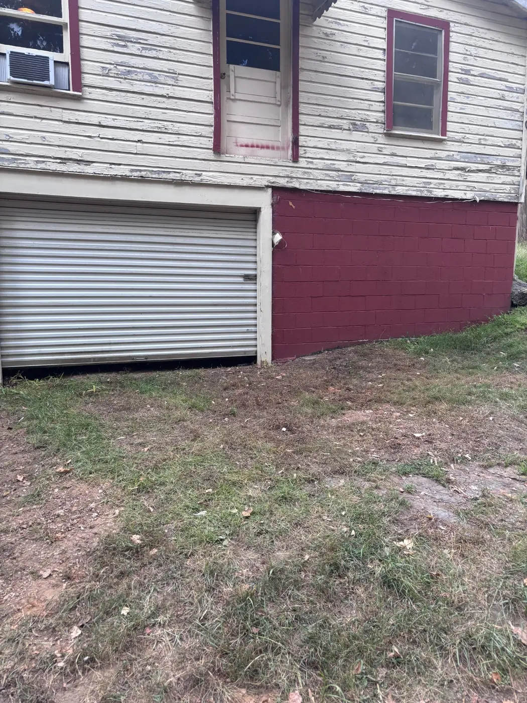 Cleared area beside a Canton home after a completed house cleanout