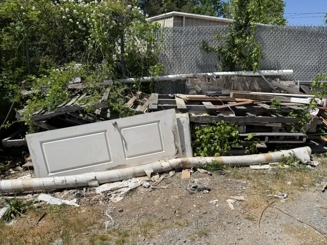 Commercial Pallet & Debris Cleanup in Holly Springs, GA — debris before