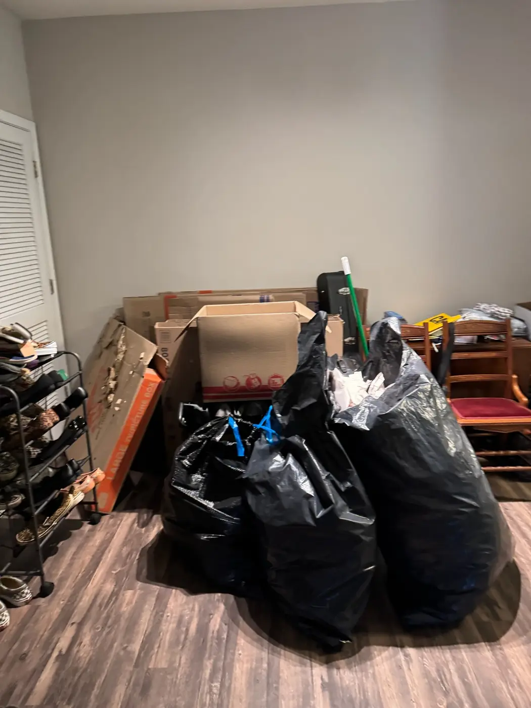 Packing boxes, bagged material and moving items ready for a Woodstock recycling pickup