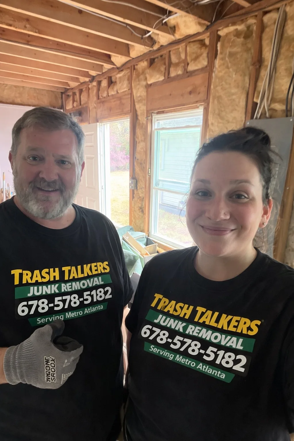 Trash Talkers owners at a job site